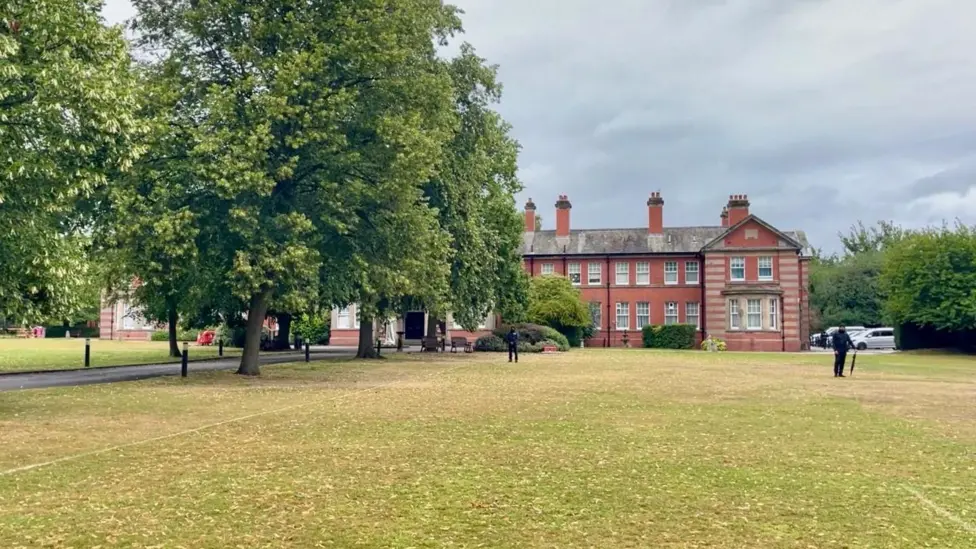 Four arrests at religious HQ